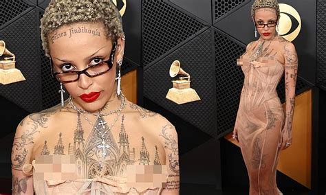 doja cat nipple|Doja Cat suffers a nip slip at Grammys 2024